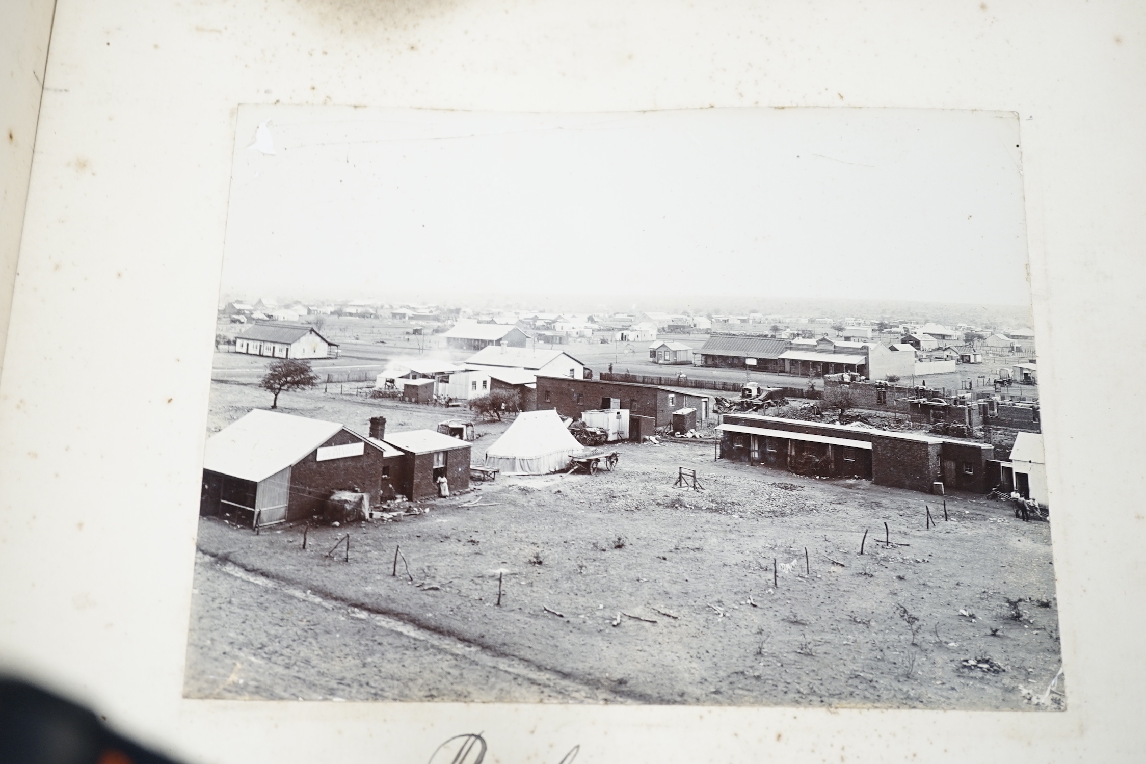 An album of albumen photographs, 1897-1902, Boer war period, predominantly South African and Tribal including Native Stadt, Machudi and Johannesburg